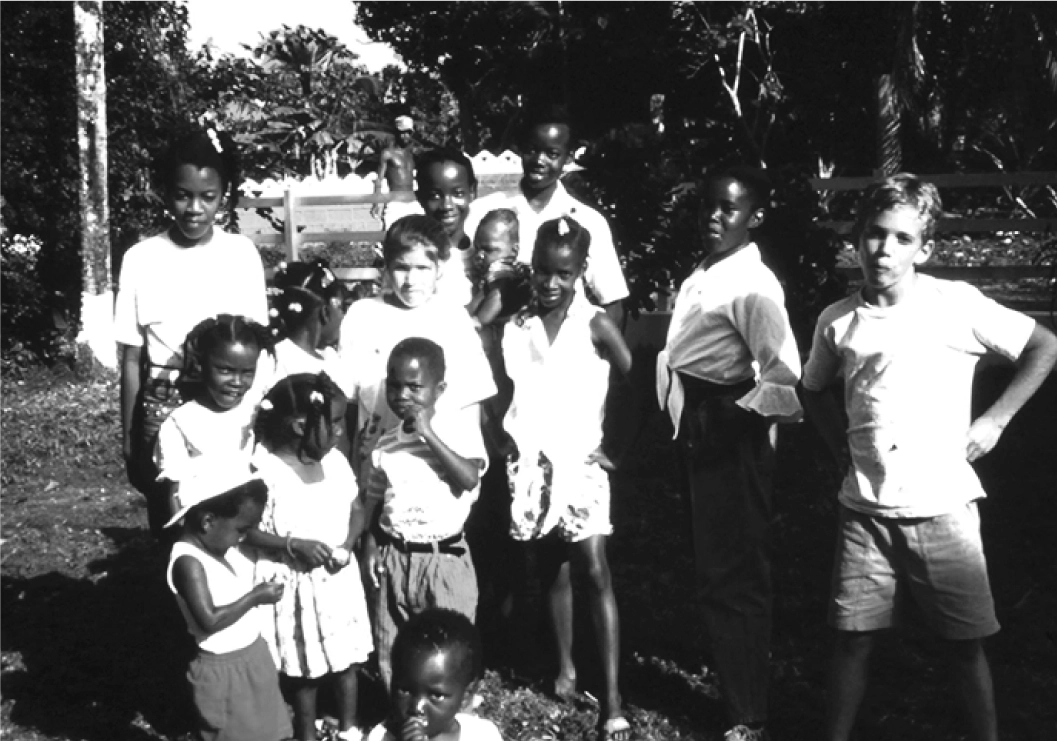 A group of children gathered outdoors in Rose Garden, Jamaica